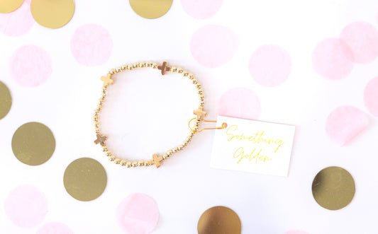 The Haven Cross Bracelet in Gold image 0
