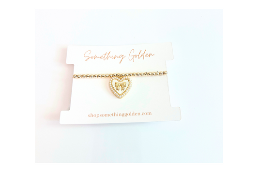 The Heart & Bow Charm