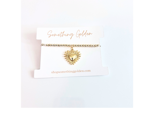 The Sun Heart Charm